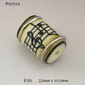 Ivory Petite Cylinder with Black Music Notes and Metallic Trim